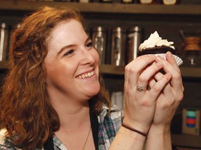 Annik Welsh, of Salute Coffee Company in Sudbury, Ont., displays a cupcake for a fundraiser the business is holding for the United Way Sudbury and Nipissing Districts on Sunday February 12, 2017. The cupcakes are $3 with all proceeds going to United Way. John Lappa/Sudbury Star/Postmedia Network