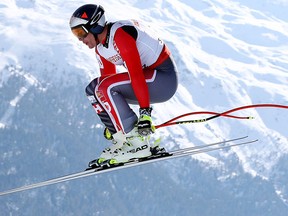 Canada's Erik Guay competes during a men's downhill race, at the alpine ski World Championships in St. Moritz, Switzerland, Sunday, Feb. 12, 2017. (AP Photo/Alessandro Trovati)