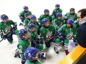 Eric Navarro, coach of the Sudbury Minor Atom AA Wolves, talks to his players prior to a game at the Gerry McCrory Countryside Sports Complex in Sudbury, Ont. on Saturday February 11, 2017. John Lappa/Sudbury Star/Postmedia Network