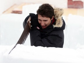 Prime Minister Justin Trudeau visits the Snow Castle on Yellowknife Bay in Yellowknife, Northwest Territories, on Friday, Feb. 10, 2017. (THE CANADIAN PRESS/Sean Kilpatrick)