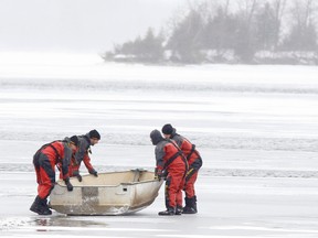 OPP divers retrieve the body of a 52-year-old snowmobiler on Buckhorn Lake, near Peterborough. (File photo)
