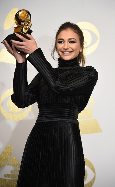 Singer Daya poses with the Best Dance Recording Grammy for "Don't Let Me Down," in the press room during the 59th Annual Grammy music Awards on February 12, 2017, in Los Angeles, California. (ROBYN BECK/AFP/Getty Images)