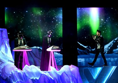 Recording artist The Weeknd (R) and music group Daft Punk perform onstage during The 59th GRAMMY Awards at STAPLES Center on February 12, 2017 in Los Angeles, California.  (Photo by Kevin Winter/Getty Images for NARAS)