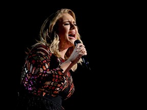 Adele performs "Hello" at the 59th annual Grammy Awards on Sunday, Feb. 12, 2017, in Los Angeles. (Photo by Matt Sayles/Invision/AP)