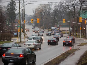 Richmond Street bends at Huron Street on this view to the north showing how tight the roadway is, especially if the city hopes to add lanes for rapid bus transit in London, Ont. (MIKE HENSEN, The London Free Press)