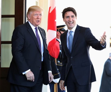 U.S. President Donald Trump greets Prime Minister Justin Trudeau upon his arrival at the White House in Washington, Monday, Feb. 13, 2017. (AP Photo/Andrew Harnik)