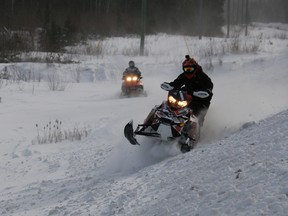 Snowmobile riders in Timmins, Ont. on Jan. 5, 2017. (Len Gillis/Postmedia Network)