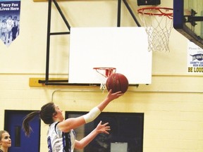 Hawk Jenna Griffin takes the basketball to the hoop Feb. 8, when the County Central High School’s senior varsity girls’ basketball team hosted Nanton’s J.T. Foster High School at the Cultural-Recreational Centre. The Hawks won 89-35.