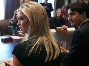 U.S. President Donald Trump (L), Prime Minister Justin Trudeau (R) listen to Ivanka Trump (C), speak during a roundtable discussion on the advancement of women entrepreneurs and business leadersat the White House Feb. 13, 2017 in Washington, D.C.  (Mark Wilson/Getty Images)