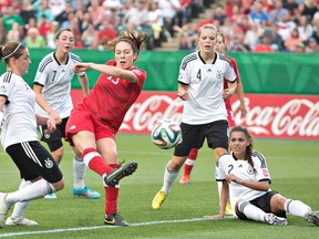 Kingston-born Lindsay Agnew, centre, was the first Canadian taken in the 2017 National Women's Soccer League draft. (Canadian Press file photo)