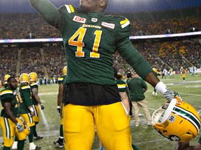 Edmonton Eskimos' Odell Willis (41) celebrates a play against the Saskatchewan Roughriders during second half action in Edmonton, Alta., on Friday July 8, 2016.