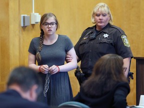 Morgan Geyser is led into the courtroom at Waukesha County Court, Friday, Aug. 19, 2016 in Waukesha, Wis.(Michael Sears/Milwaukee Journal-Sentinel via AP)