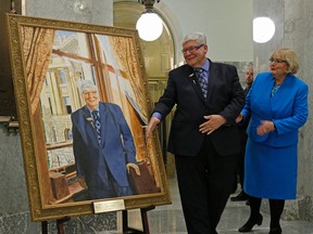 The official portrait of former Alberta Premier David Graeme Hancock, Alberta’s 15th Premier, painted by artist Tom Menczel, was unveiled at the Alberta Legislature on Monday, February 13, 2017. In this photo Dave and his wife Janet view the portrait after the unveiling. (Photo by Larry Wong/Postmedia)