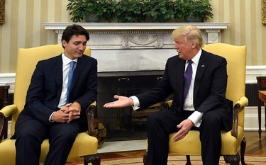 Prime Minister Justin Trudeau meets with US President Donald Trump in the Oval Office of the White House in Washington, DC on Monday, Feb. 13, 2017. THE CANADIAN PRESS/Sean Kilpatrick ORG XMIT: SKP141