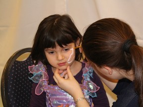 Tracy, 4 was one of many of the children to get their face painted at the Ball.