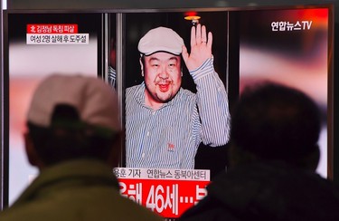 People watch a television showing news reports of Kim Jong-Nam, the half-brother of North Korean leader Kim Jong-Un, at a railway station in Seoul on February 14, 2017. Kim Jong-Nam, the half-brother of North Korean leader Kim Jong-Un has been assassinated in Malaysia, South Korean media reported on February 14. / AFP PHOTO / JUNG Yeon-JeJUNG YEON-JE/AFP/Getty Images
