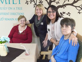 Verna Chalcraft, far left, and Donna White, far right, are two residents at the Meadow Park Long Term Care facility on Sandys Street in Chatham. Staff there like Lydia Swant, second from left, and Anne-Marie Rumble, second from right, are petitioning the provincial government for increased funding and community accessibility for seniors requiring long term care.
