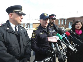 Brampton Deputy Fire Chief Peter Gatto and Ontario Fire Marshal investigator Ross Nichols speak to the media at the scene of a fatal fire in Brampton on Madison St. Tuesday February 14, 2017. (Jack Boland/Toronto Sun)