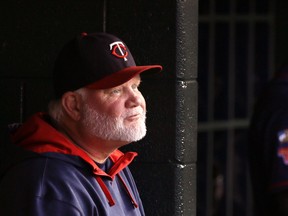 In this Saturday, Sept. 27, 2014, file photo, Minnesota Twins manager Ron Gardenhire sits in the dugout during a game against the Detroit Tigers in Detroit. (AP Photo/Carlos Osorio, File)