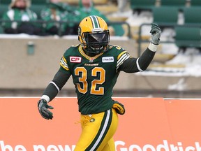 The Edmonton Eskimos' Kendial Lawrence (32) celebrates after returning a punt for a touchdown against the Saskatchewan Roughriders' during first half Western Semi Final CFL action at Commonwealth Stadium, in Edmonton on Sunday Nov. 16, 2014.