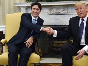 Prime Minister Justin Trudeau meets with U.S. President Donald Trump in the Oval Office of the White House, in Washington, D.C., on Monday, Feb. 13, 2017. (THE CANADIAN PRESS/Sean Kilpatrick)