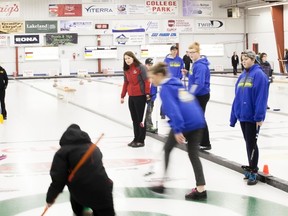 Two-time Canadian Women’s Curling Champion Heather Nedohin watches a group of students curl at the Vermilion Curling Arena, during a special Learn to Curl clinic at the Vermilion Curling Arena on February 9, 2017. Taylor Hermiston/Vermilion Standard/Postmedia Network.