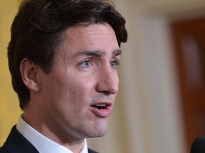 Canada's Prime Minister Justin Trudeau speaks during a joint press conference with US President Donald Trump in the East Room of the White House on February 13, 2017 in Washington, DC. (AFP PHOTO/MANDEL NGANMANDEL)