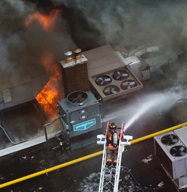 Fire rages at The Badminton & Racquet Club of Toronto as firefighters battled a 6 alarm fire throughout the day  on Tuesday February 14, 2017. Stan Behal/Toronto Sun/Postmedia Network