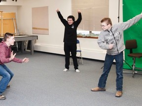 Steven Bodurka (center-left) enacts a goaltender, while his brother Austin plays a hockey player, and Dawson Campbell (centre right) acts like a fan with student helper Owen Atkins (left), during an improv exercise on Wednesday, February 8, 2017, in Kitscoty, Alta. Taylor Hermiston/Vermilion Standard/Postmedia Network.