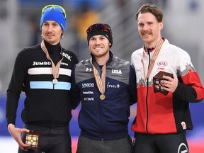 Alexis Contin of France (silver), Joey Mantia of the USA (gold) and Olivier Jean of Canada (bronze) pose with their medals for the men mass start during the ISU World Single Distances Speed Skating Championships on Feb. 12, 2017 in Gangneung, South Korea. (Atsushi Tomura/Getty Images)
