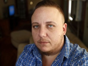 Jionni Conforti filed a federal lawsuit after uterus removal surgery as part of his sex transition was canceled by St. Joseph's Regional Medical Center in Paterson, N.J. (AP Photo/Julio Cortez, File)