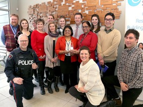 Members of the Kingston Immigration Partnership were presented with the fourth annual Family Advocacy Award from Family and Children’s Services of Frontenac, Lennox and Addington on Tuesday February 14 2017. The award was presented to KIP for its work over the past 17 months resettling Syrian refugees. (Ian MacAlpine/The Whig-Standard)