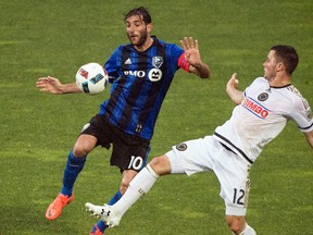 Montreal Impact’s Ignacio Piatti (10) challenges Philadelphia Union’s Keegan Rosenberry (12) during MLS action in Montreal, Saturday, May 14, 2016. (THE CANADIAN PRESS/Graham Hughes)