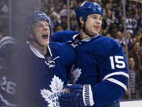 Matt Martin (right) has a lot of influence on younger teammates (Craig Robertson/Toronto Sun)