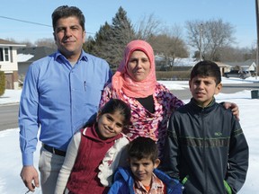The Al Hallak family from Syria, sponsored by the St. Mary's Roman Catholic Church parish, have been living in Tillsonburg for one year. From left are Abid and Amira, with their children Mariam, Ahmad and Mohammad. (CHRIS ABBOTT/TILLSONBURG NEWS)