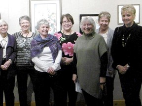Several members of the Bridge Street Artists gather on opening night of the Painters & Potters Show and Sale at The Station Arts Cente. From left are Catherine Prong, Linda Hawken, Maxine MacPhail, Cathy Barzo, Jane Grass, Ingrid Irwin and Ann Loker. (CONTRIBUTED PHOTO)