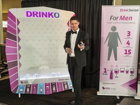 Games show style host Tyler Rygus hosts the Drinko game. The Alberta Gaming and Liquor Commission have launched a Drinko game board as apart of their DrinkSense campaign, intended to educate players on the importance of drinking in moderation on Feb. 15, 2017. Photo by Shaughn Butts / Postmedia