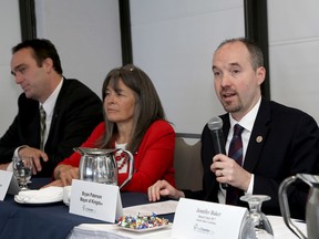 Kingston and the Islands MP Mark Gerretsen, left, MPP Sophie Kiwala and Mayor Bryan Paterson speak during the Greater Kingston Chamber of Commerce Political Breakfast at the Delta Kingston Waterfront Hotel on Wednesday. (Ian MacAlpin/The Whig-Standard)