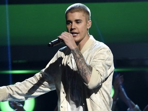 Justin Bieber performs at the Billboard Music Awards in Las Vegas. A Las Vegas man who says Bieber assaulted him in Cleveland eight months ago has filed a police report about the fracas. (Chris Pizzello/Invision/AP, File)