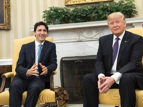 U.S. President Donald Trump (R) meets with Prime Minister Justin Trudeau of Canada in the Oval Office at the White House on February 13, 2017 in Washington, D.C. This is the first time the two leaders are meeting at the White House. (Photo by Kevin Dietsch-Pool/Getty Images)