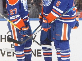 Edmonton Oilers right wing Jordan Eberle (14) centre Connor McDavid (97) and left wing Patrick Maroon (19) celebrate a goal against the Arizona Coyotes at Rogers Place on Tuesday February 14, 2017.