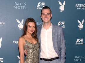 Actress Scarlettt Byrne and Cooper Hefner arrive at the Playboy and A&E Bates Motel Event During Comic-Con Weekend, on July 25, 2014 in San Diego, California. (Photo by Jason Kempin/Getty Images for Playboy)