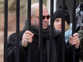 Arpad Horvath watches as Elizabeth Wettlaufer leaves the Woodstock courthouse after a Jan. 13 appearance.  Horvath was back in court for Wettlaufer?s appearance by video link Wednesday. (MORRIS LAMONT, The London Free Press)