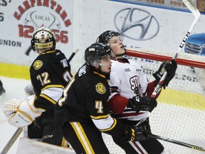 Guelph Storm forward James McEwan, alongside Sarnia Sting defenceman Jeff King, stares up in disbelief after his shot went over goalie Justin Fazio's net during the Ontario Hockey League game at Progressive Auto Sales Arena on Wednesday, Feb. 15, 2017 in Sarnia, Ont. Sarnia won 6-2. (Terry Bridge/Sarnia Observer)