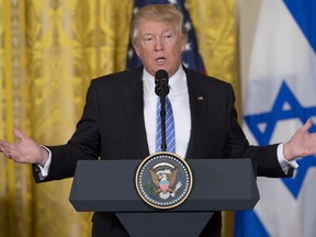 US President Donald Trump speaks during a joint press conference with Israeli Prime Minister Benjamin Netanyahu in the East Room of the White House in Washington, DC, February 15, 2017. / AFP PHOTO / SAUL LOEBSAUL LOEB/AFP/Getty Images  US-ISRAEL-NETANYAHU-TRUMP-DIPLOMACY