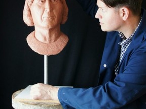 Portraitist Christian Corbet works on a clay bust of Robert the Bruce, an art work that included collaborative research with Western University bio-archaeologist Andrew Nelson. The bust is the first commissioned by the Bruce family, based on evidence from a cast of the king?s skull. Nelson?s research concluded the skull shows no signs of leprosy, despite contemporary and later rumours Robert the Bruce had the disease. (Photo Courtesy of Christian Corbet)
