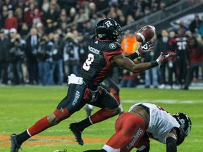 Ernest Jackson (left) catches the ball for a touchdown to help the Redblacks win the Grey Cup championship in overtime against the Stampeders in Toronto on Nov. 27, 2016. Jackson signed as a free agent with the Alouettes on Thursday, Feb. 16, 2017. (Craig Robertson/Postmedia Network/Files)