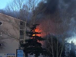 Fire crews are battling a blaze at Westridge Estates, at 7611 172 St. in west Edmonton, on Thursday, February 16, 2017. Nicole Bergot/Postmedia