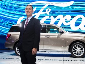Ford Canada president Mark Buzzell poses in front of the 2017 Ford Expedition during the Canadian International Autoshow, in Toronto on Thursday, February 16, 2017. (THE CANADIAN PRESS/Mark Blinch)