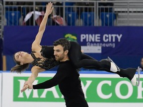 Meagan Duhamel and Eric Radford of Canada perform during the Pair Short Program event at the ISU Four Continents Figure Skating Championships in Gangneung on February 16, 2017. The ISU event is a test event for the upcoming PyeongChang 2018 Winter Olympic Games. / AFP PHOTO / KIM DOO-HOKIM DOO-HO/AFP/Getty Images